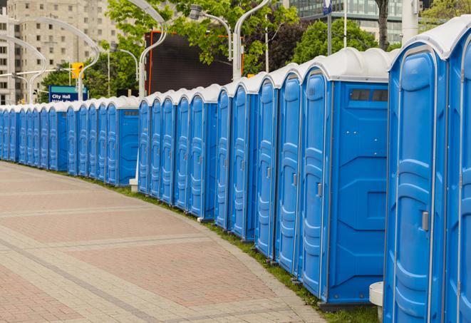 a row of portable restrooms ready for eventgoers in Boston